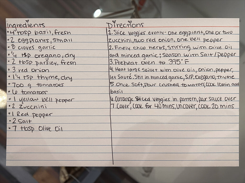 Handwritten - Recipe card for Ratatouille: Vibrant Ratatouille made with tomatoes, zucchini, eggplant, and bell peppers, garnished with fresh herbs.